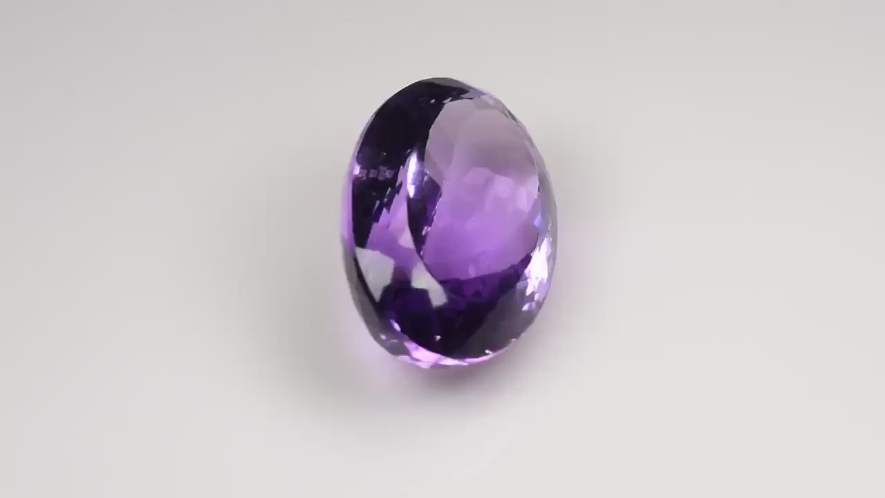 Natural Amethyst 30.61 carats, fancy oval cut, purple color, heat treated gemstone
