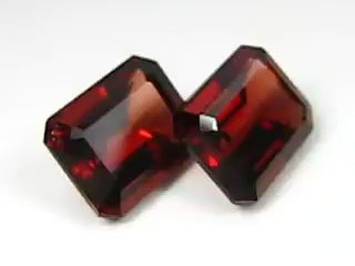 Natural almandine garnets, 5.70 carats total, emerald cut, VVS clarity, untreated, red, matching pair