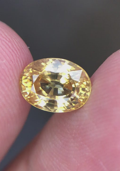 Natural honey yellow zircon, 3.29 carats, oval cut, VVS clarity, untreated, from Cambodia