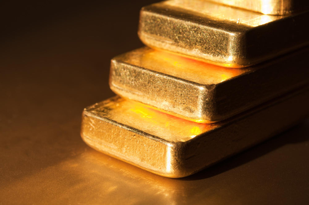 Gold bars on golden table