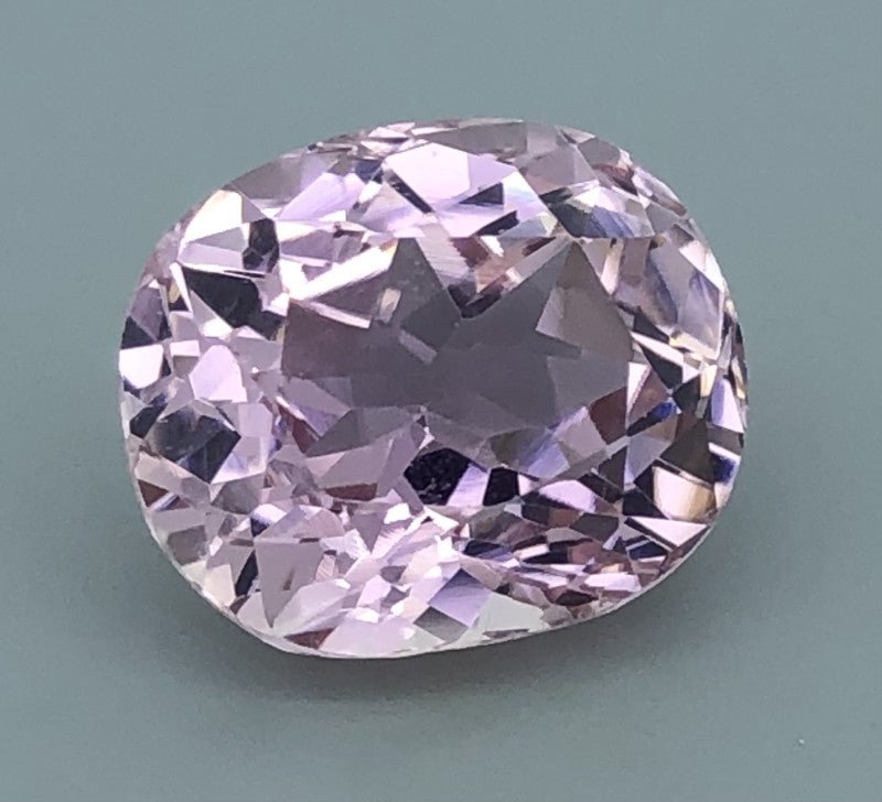 Kunzite 21.61 ct – Light Pink, Oval Cut, HGTL Certified