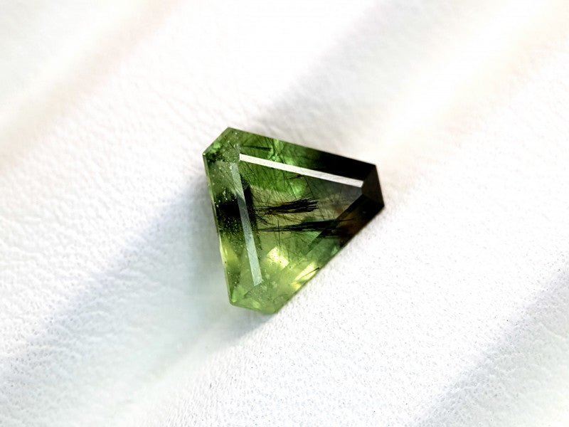 Natural Rutiled Peridot 2.85 ct – Green, Trillion Cut, Untreated
